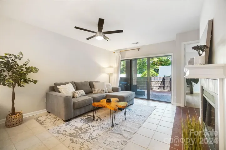 The living room features a generous open floor plan that maximizes space and allows for versatile furniture arrangements.