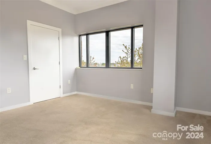 Spacious and open with a nice sized closet and more natural light streaming in from the other side.