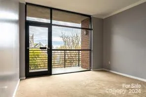 Open floor plan that boasts a nice living area. Imagine enjoying a cup of coffee off your balcony first thing in the morning!