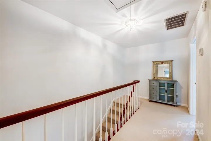 Upstairs, 2 BRs & full bath provide additional space for guests or family