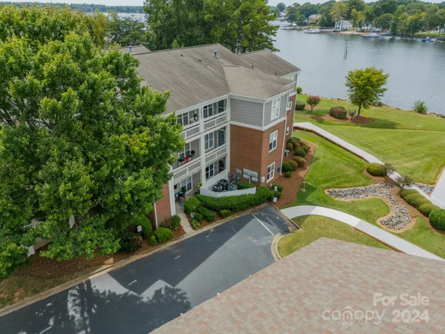 See the walkway leading from the parking to the building?  That is how close you will be to your new condo!  Easy peasy.