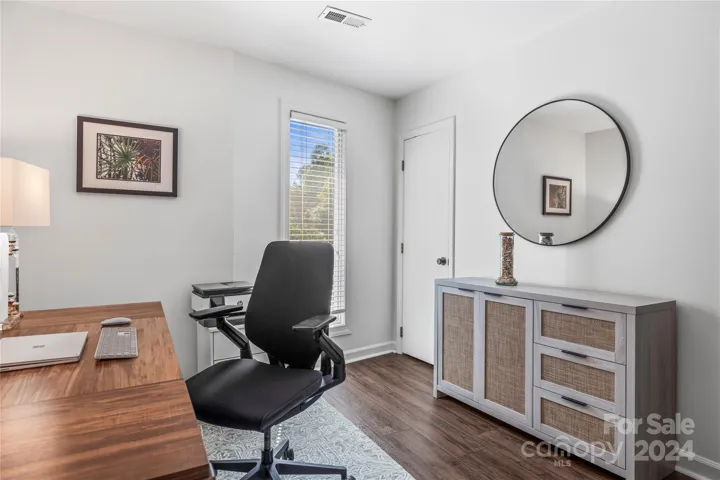 Bedroom 4 has a closet and is currently being used for that popular home office