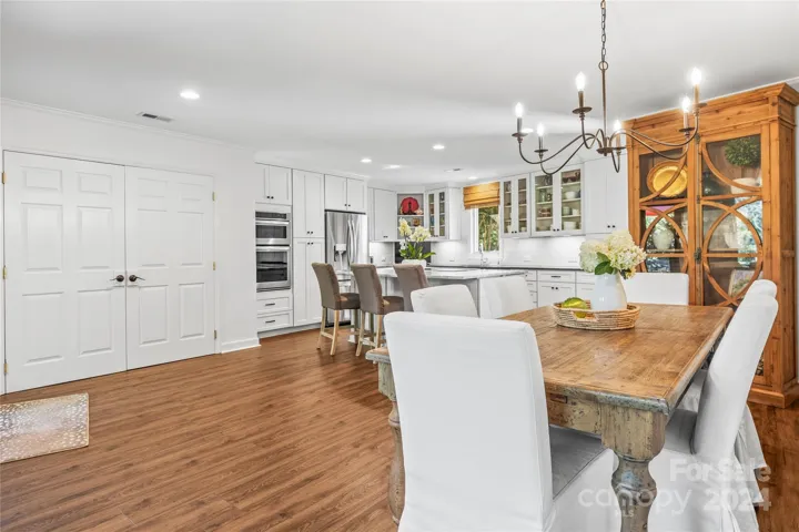 The dining area is open to the kitchen which creates inviting space for formal or informal gatherings