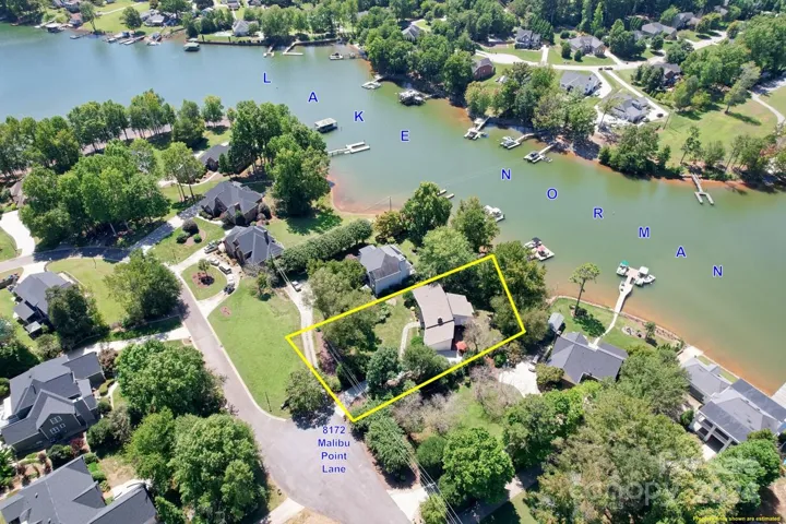 Aerial view showing approximate lot lines and street scape as well as beautiful Lake Norman