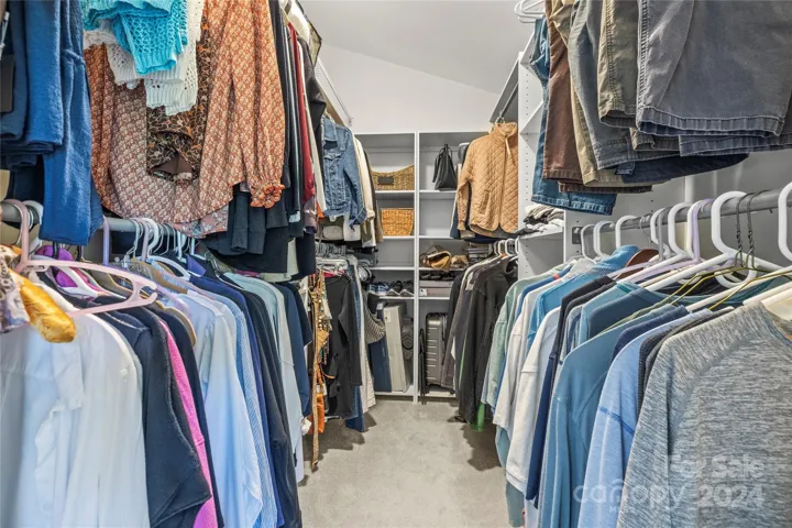 The large WIC closet features built in shelving