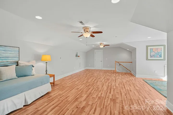 Storage areas off both ends of the room