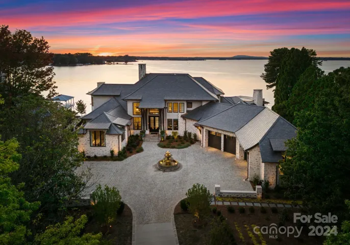 Endless views of Lake Norman set the backdrop for this exquisite home.