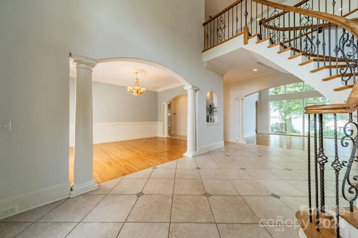 Foyer looking to dining room and lake view