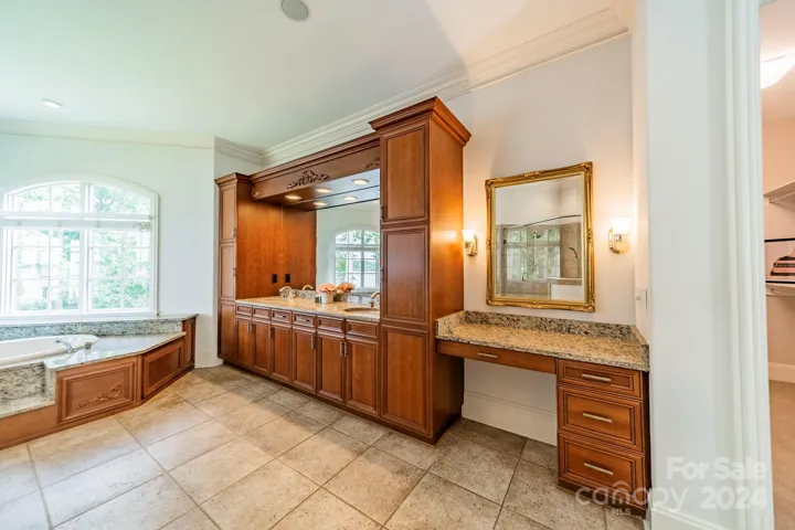 Large Primary bathroom with walk in closet