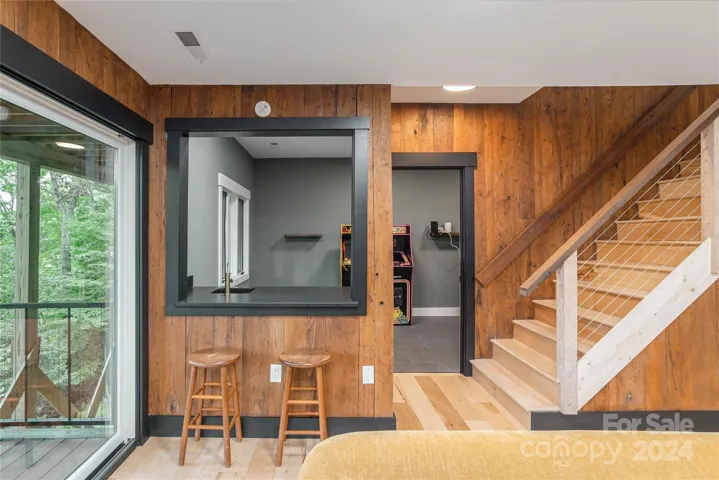 Retro Wet Bar with Beverage Fridge and Laundry Room