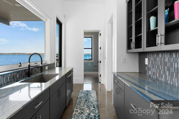 Open-air pass through window in the guest house kitchenette.