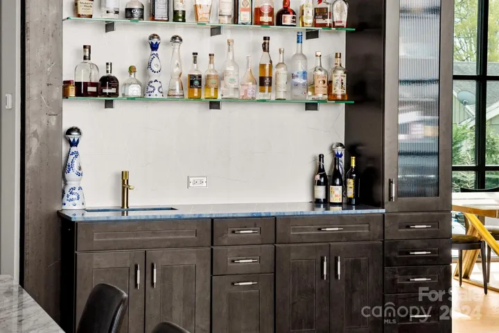 Sleek wet bar for easy entertaining.
