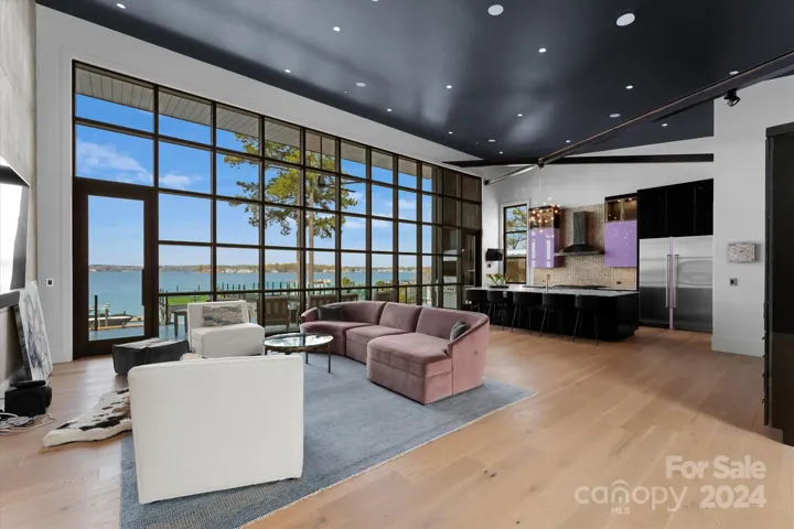 Open concept upper level with an array of artfully crafted architectural elements.