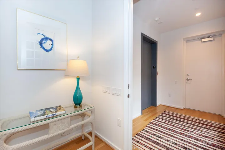 Step off the elevator into your foyer