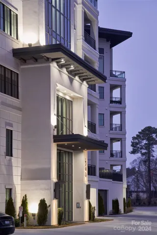Building 300... Private Penthouse 2 car garage is to the right of building entrance.