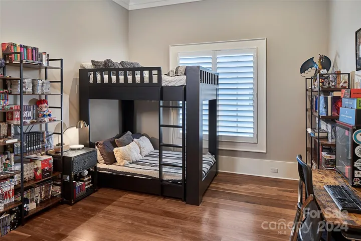 Secondary BRs feature walnut floors, wooden shutters and in ceiling speakers.