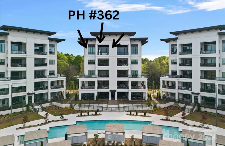 Spectacular Penthouse with sunset views overlooking resort style pool & neighboring treetops.