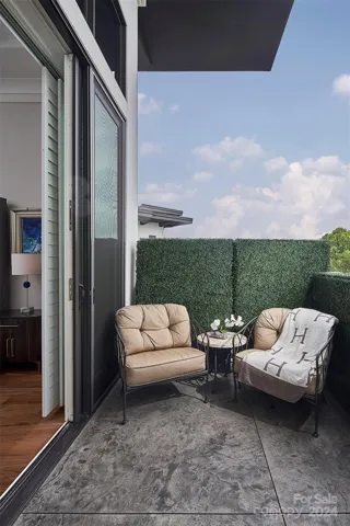Private balcony off primary suite.