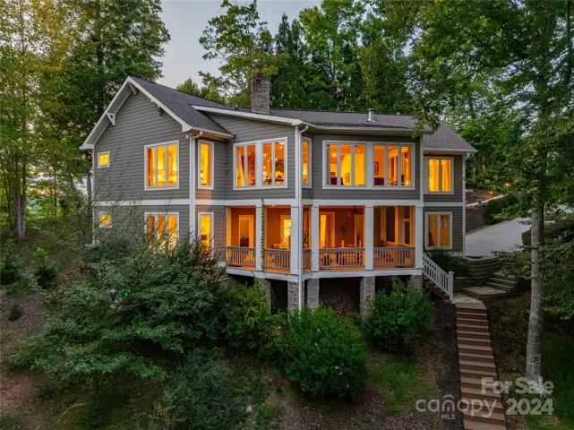 Welcome to this stunning custom-built waterfront home with breathtaking lake views from nearly every room!