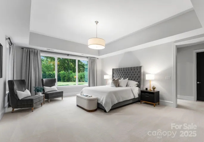 Lower level VIP guest suite bedroom #6, with ensuite bathroom and large walk-in custom closet