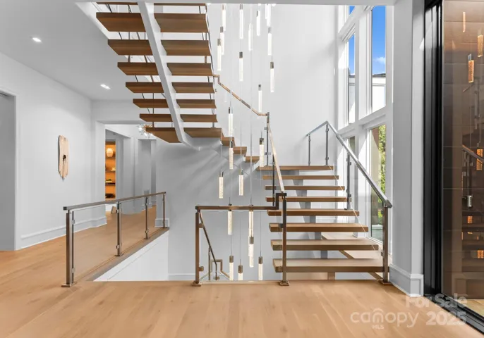 Floating staircase with eye catching chandelier