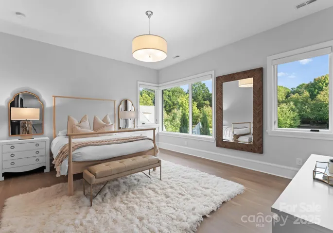 Upper level guest bedroom #5 with ensuite bathroom and custom walk-in closet