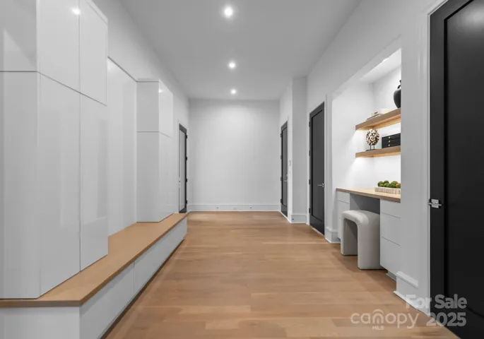 Drop Zone area with custom cabinetry and desk area