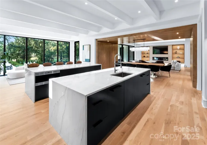 Double islands with natural quartzite countertops