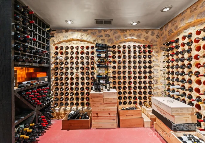 The temp controlled wine cellar is ready for a new collection.Plenty of space for planning your next wine dinner. Sub zero Wine chiller in the kitchen.