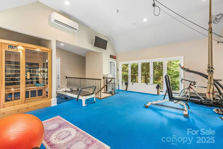 Home gym that is second to none. From the padded floor, to the floor to ceiling mirrors, a dry sauna plus a half bath.