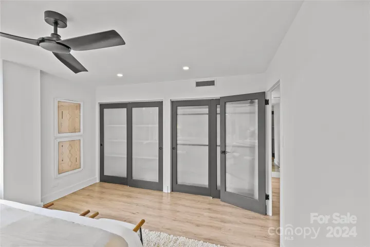 Primary Bedroom offer two double closets with custom organizers.