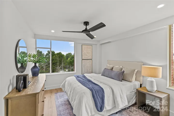 Another secondary Bedroom, with recessed lighting and large windows for abundance of natural light and views!