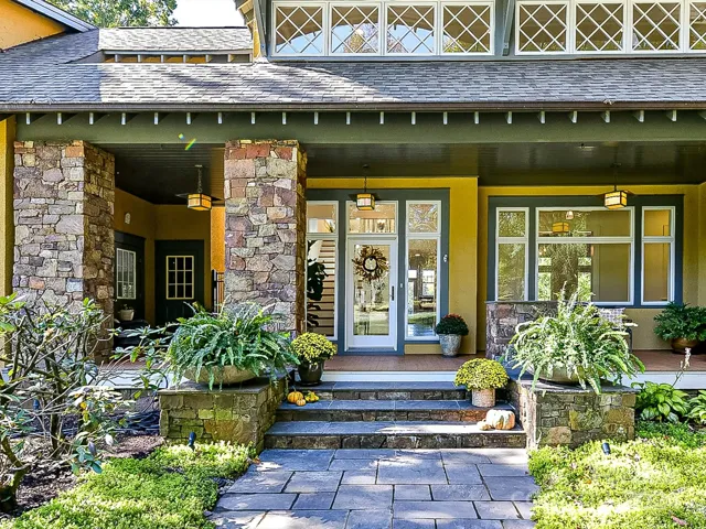 Massive open spaces allow natural lighting and nature to flood into the interior of the home.