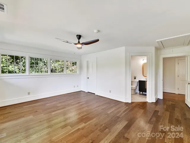 Upstairs private ensuite with bath could be secondary primary bedroom with nice walk-in closet