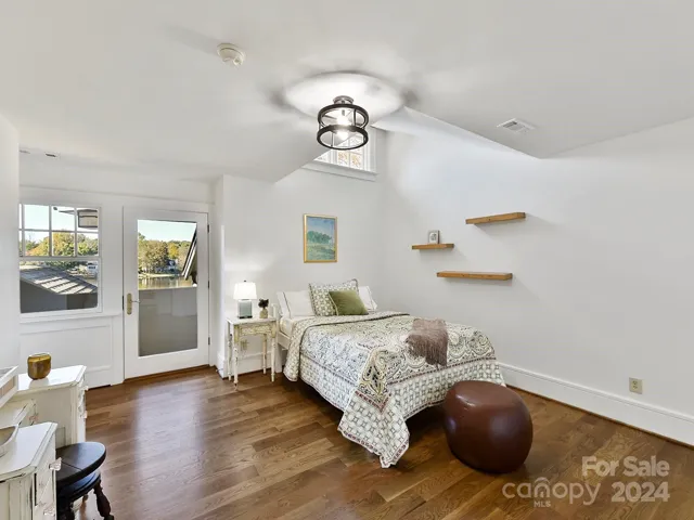 Each ensuite with private bath has refinished hardwood floors, updating bathrooms and several have private balconies with views of the lake.