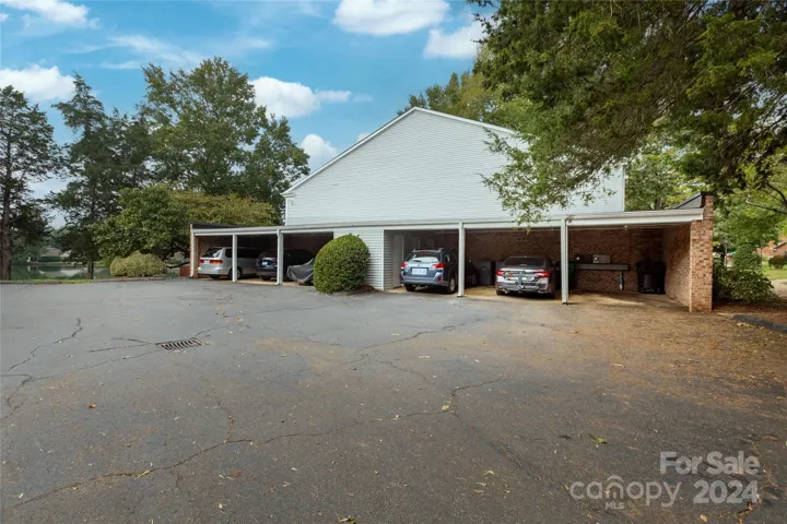One covered parking spot/storage along with a designated parking spot in lot.
