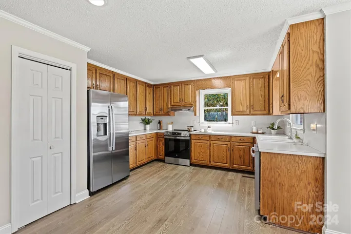 Open kitchen with SS appliances