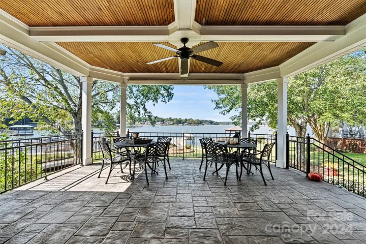 Covered patio with 3-sided lake view