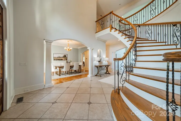 Enter the Foyer with 20 foot ceilings
