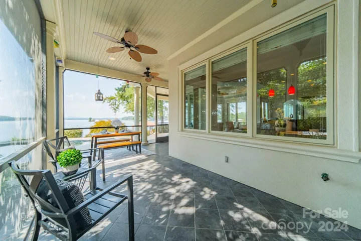 Screened patio to enjoy guest at the pool or take in the lake view