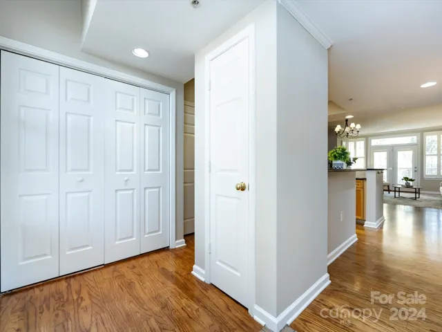 Bright, Airy Entryway with beautiful hardwood floors!