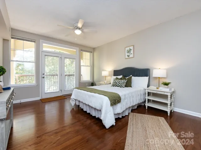 Spacious Primary Bedroom with private balcony access, walk in closet & private bath!