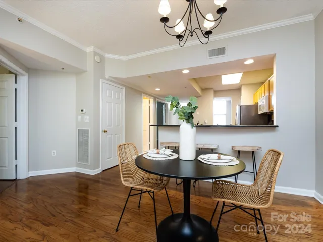 Dining Area with crown molding & hardwoods!