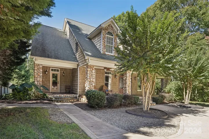 Hard to find custom built waterfront home with a pool.