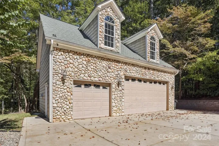 Detached 3 car garage - heated and cooled - currently finished out for flex space