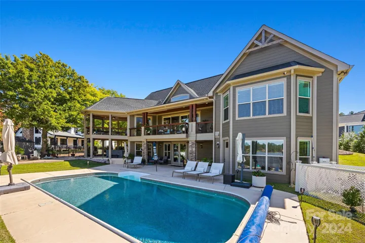 Heated pool with roll out cover.