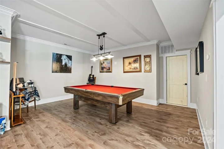 Billiard room. Door opens to storage area.