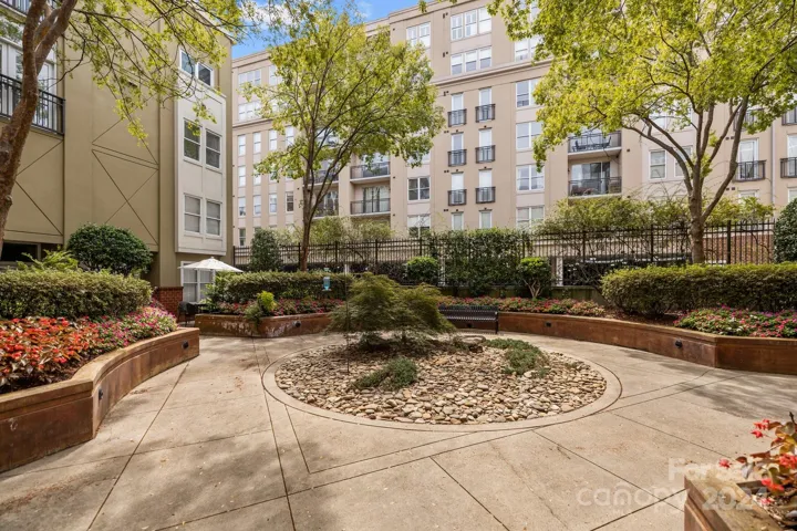 Lushly landscaped courtyard adds a touch of elegance and tranquility, enhancing the overall living experience by offering a private, well-maintained garden that residents can enjoy year-round.