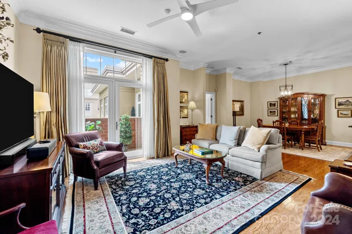 Open floor plan seamlessly connects the living space with the dining area -- perfect for daily living and for entertaining. Glass door leads to a private balcony where you can enjoy a morning coffee or unwind in the evening.