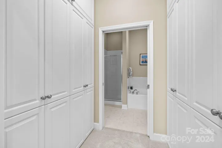 Storage room/closet situated between the home's second bedroom and bathroom. This is a level of storage not usually seen in a condo.